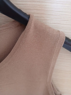 Beige vest used, size M