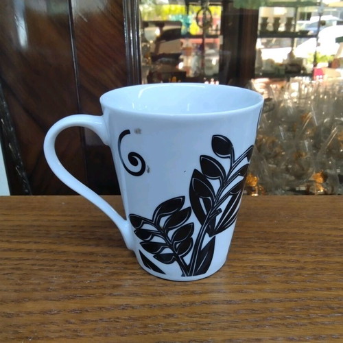 Ceramic mug leaves like new 10x6x9