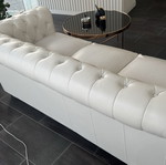 Leather three-seater sofa
