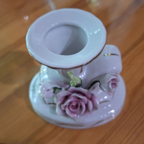 Porcelain candlestick with gilded elements like new