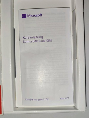 Nokia Lumia 640 mobile box used with booklet in German