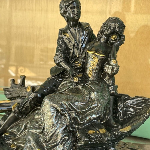 Vintage statue of a loving couple with wooden base like new