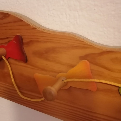 Vintage wooden children's wall hanger with kite design