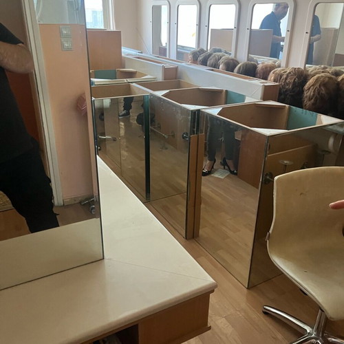Hair salon items used, mirrors, furniture and chairs