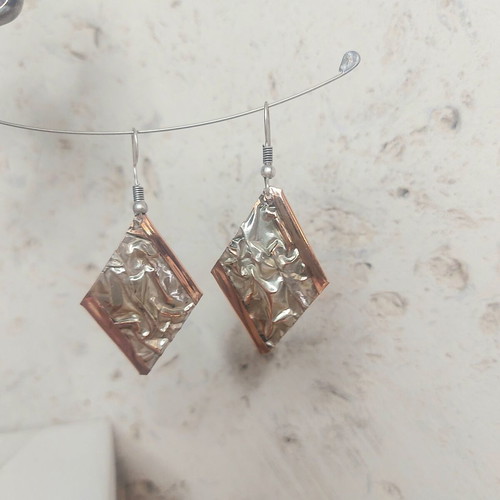 Silver plating dangling earrings like new, gold and silver colors