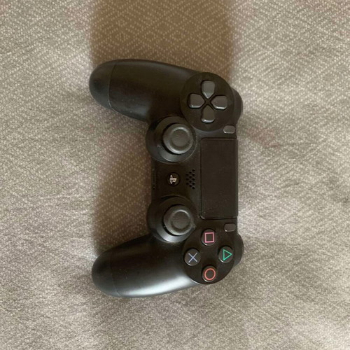Sony PS4 500GB console with 2 controllers and 4 games