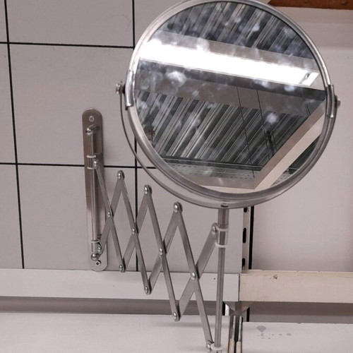 Mirror new with magnifying side and nice design