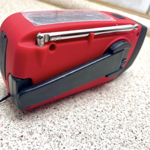 Multifunctional Emergency Gadget with FM Radio, Powerbank, Solar and Hand Charging, Flashlight