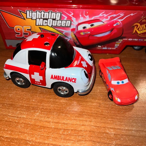 Ambulance toy car used with opening doors and pull-back mechanism