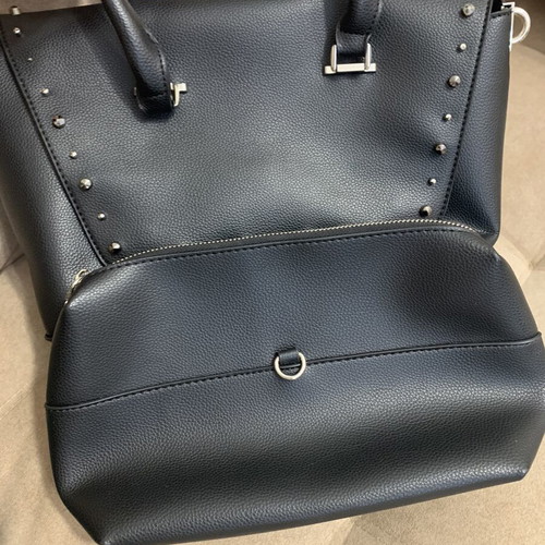 Black handbag with studs used, includes detachable pouch