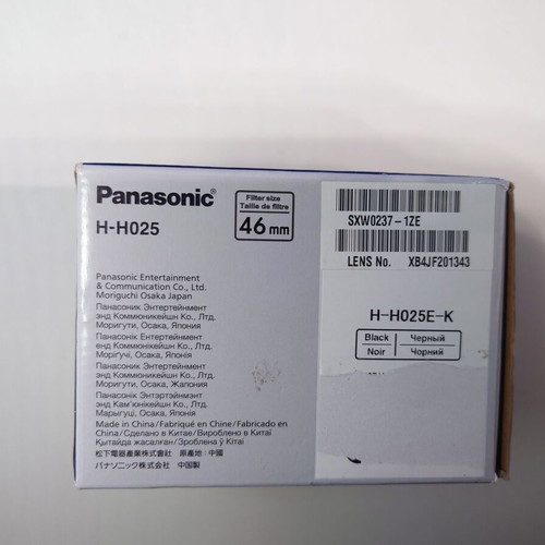 Empty box and manuals for Panasonic Lumix-G 25mm f/1.7 ASPH lens used