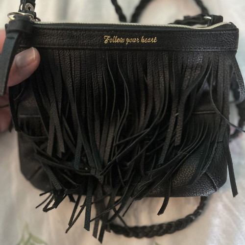 H&M black shoulder bag with fringe and "Follow your heart"