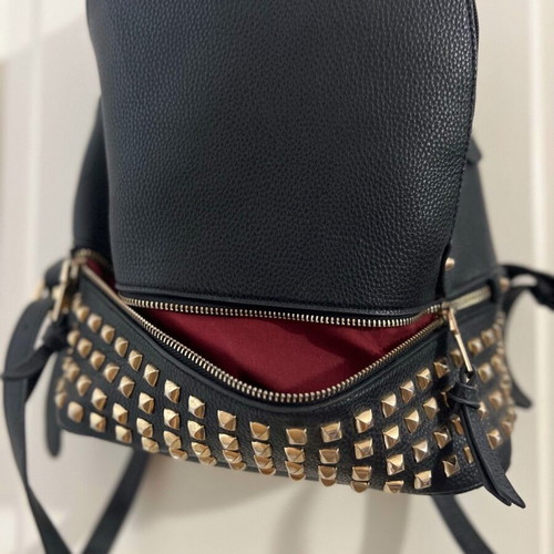 Black backpack used with studs