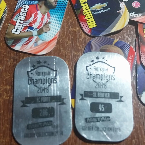 Metal tags with football players, pack of 45, like new