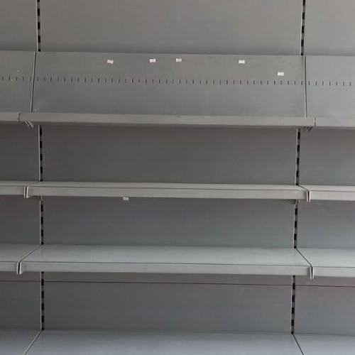 Μεταλλικά ράφια καταστήματος μεταχειρισμένα με φωτιζόμενη μετώπη και αξεσουάρ