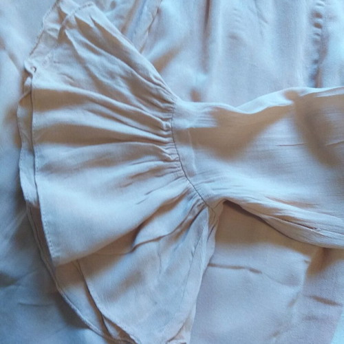 Women's blouse used with flounce in salmon color