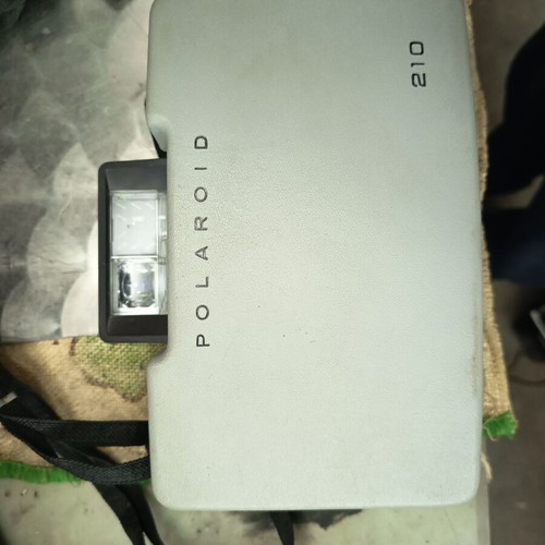 Polaroid 210 camera used with carrying case and manuals
