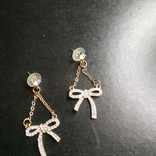 Bow earrings dangling new