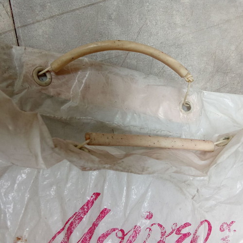 Vintage plastic bag from Mouger store 1950s 1960s used