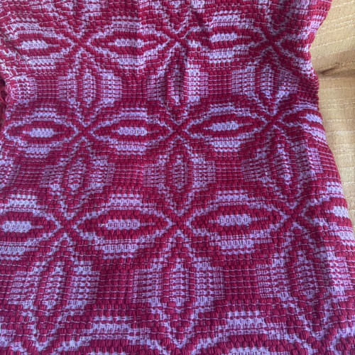Wool woven blanket used, red with traditional pattern