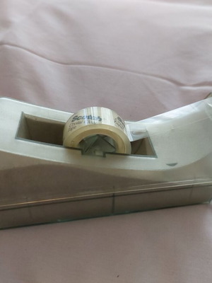 Scotch tape dispenser used