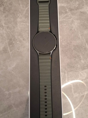 Samsung Galaxy Watch 7 smartwatch with cracked screen
