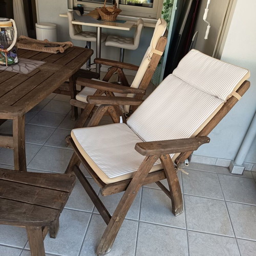 Wooden veranda dining set with folding chairs and cushions, like new