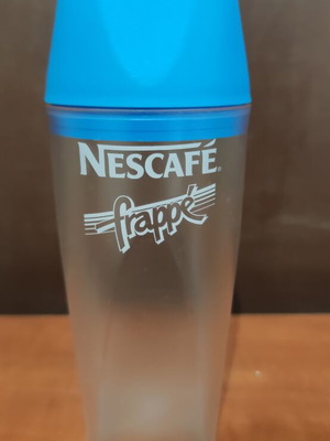 Nescafé Frappé shaker with blue lid