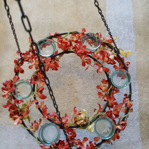 Decorative metal wreath like new with glass candle holders