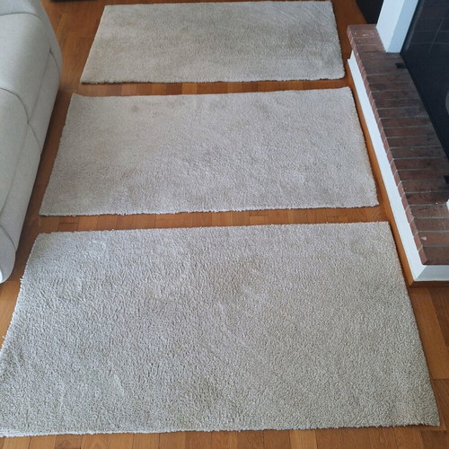 Beige rugs like new, pack of 4 pieces