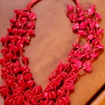 Red multi-strand stone necklace