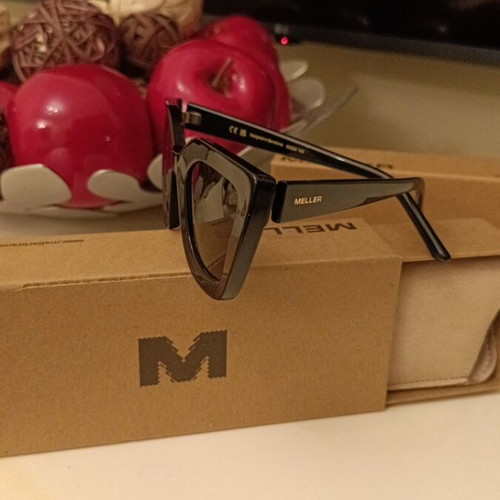 Meller Azalee sunglasses new with black polarized lenses