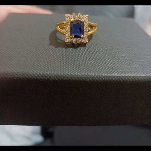 Gold-Plated Ring with Blue Stone and Elegant Setting