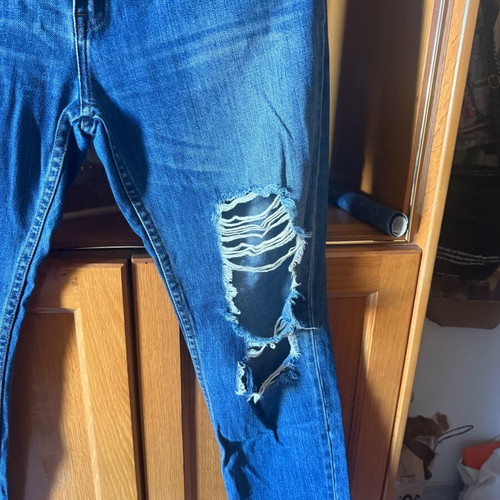 Pull & Bear jeans new with knee rips, size L