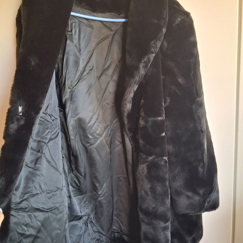 Elegant black fur coat, medium to large size