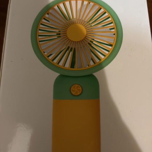 Handheld fan with base and charging cable, rechargeable