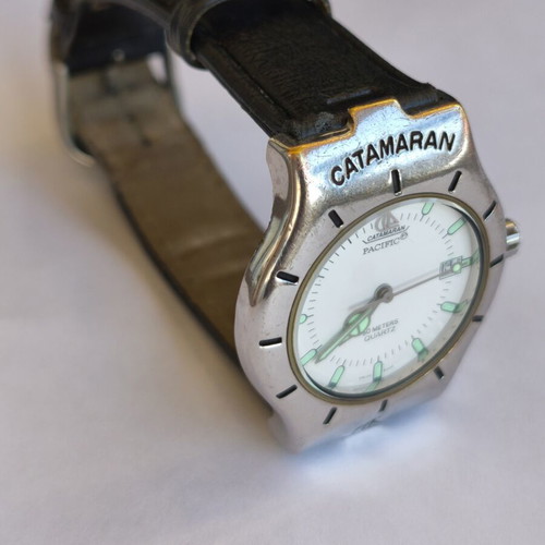 Catamaran Pacific wristwatch used, unisex, black leather strap worn