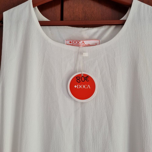 Doca dress new, white, fits small and medium sizes