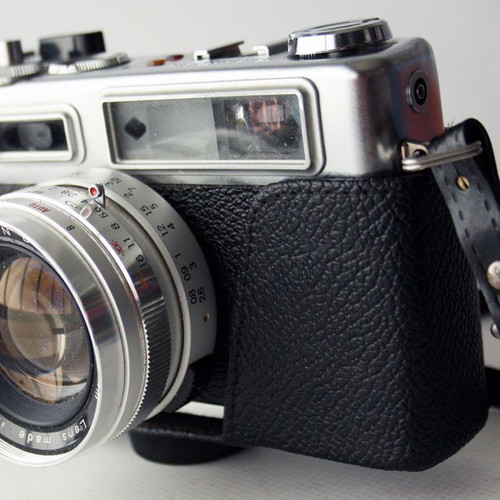 Yashica Electro 35 camera used with flash and case