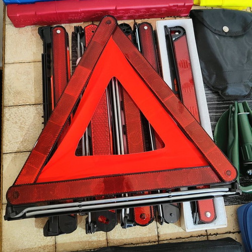 Car safety kit with fire extinguisher, triangles, first aid kits, shovel, vest