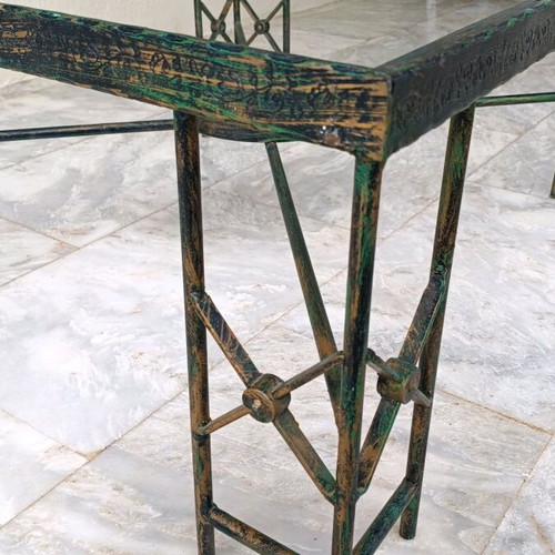 Metal table used with ceramic decoration and antique finish