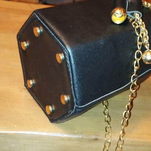 Modern pouch bag like new, black and gold