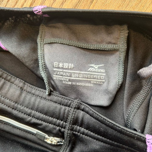Mizuno cycling shorts like new, black with purple details, size S