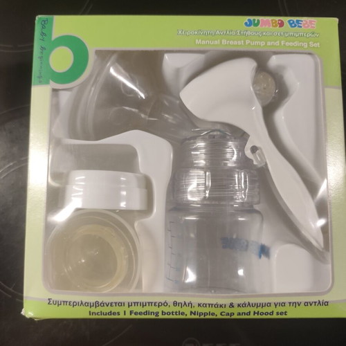 Manual Breast Pump with Bottle Set like new