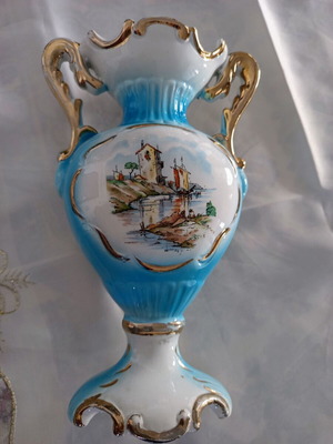 Vintage ciel vase with castles and gold decoration with damage