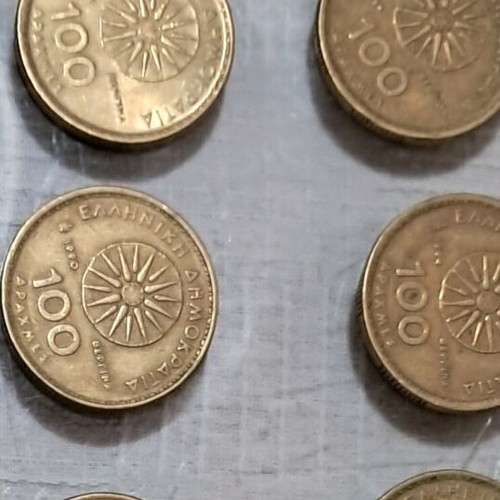 Coins used, pack of 12×100 drachmas
