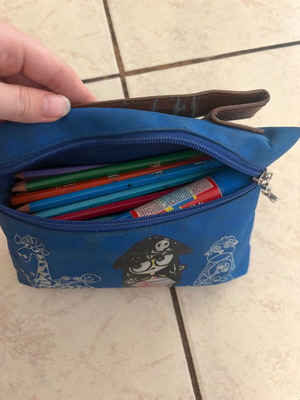 Blue school pencil case with markers and colored pencils