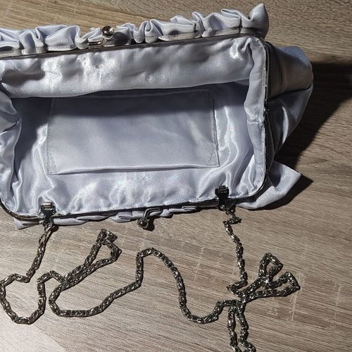 Satin silver bag used with stones and chain