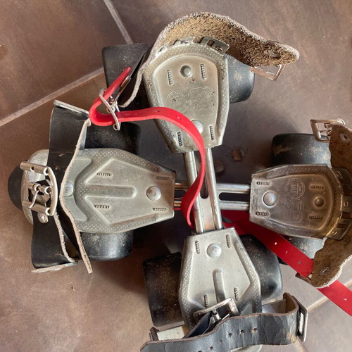 Vintage adjustable size roller skates used