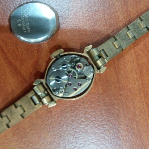 Fludo wristwatch used, women's, wind-up, gold color, steel 1000